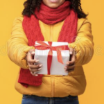 woman giving a christmas gift